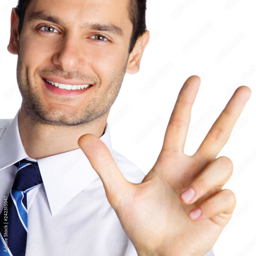 Businessman showing three fingers, isolated Businessman showing three fingers, isolated