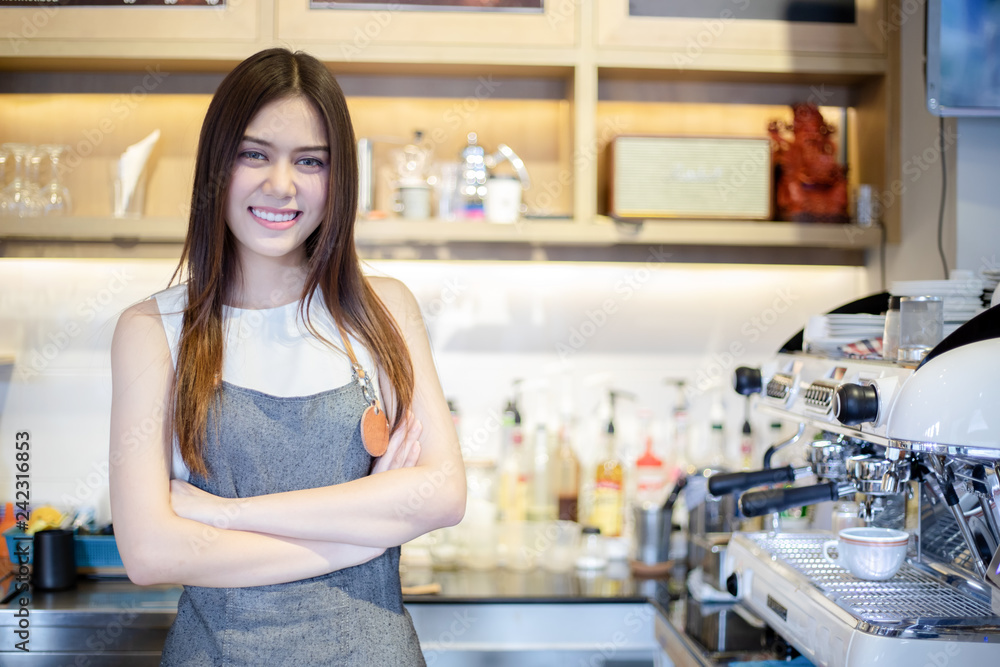 Asian women Barista smiling and using coffee machine in coffee shop counter - Working woman small business owner food and drink cafe concept Asian women Barista smiling and using coffee machine in coffee shop counter - Working woman small business owner food and drink cafe concept