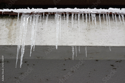 Icicle formation danger building street detail