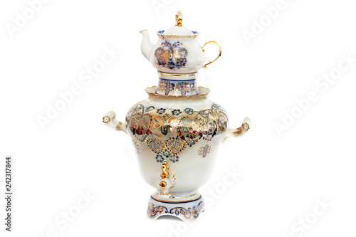 Porcelain samovar and kettle on a white background