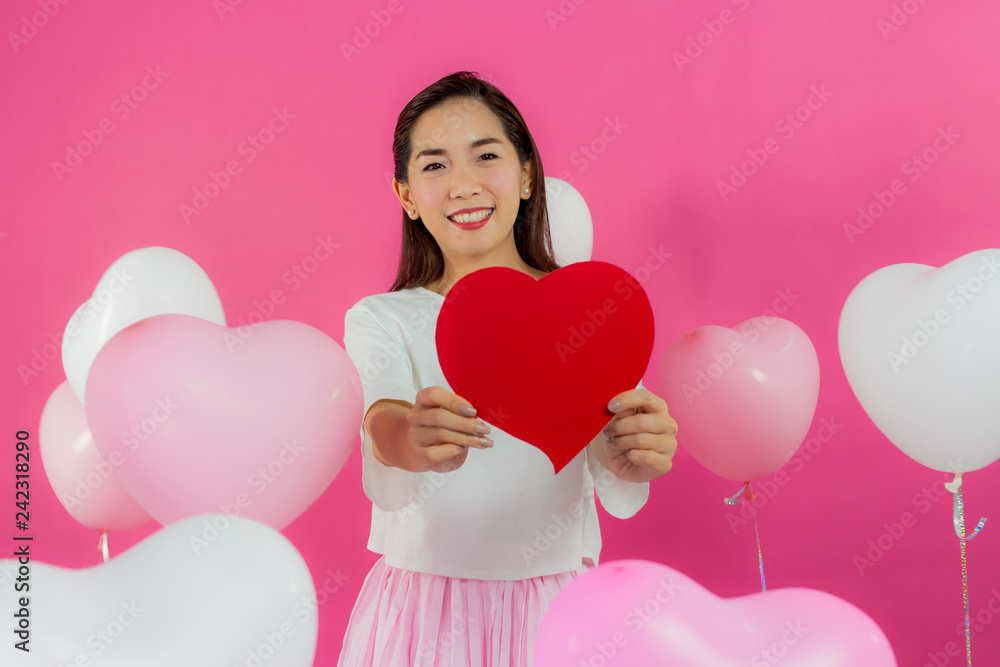 valentine day concept. Beautiful smiley asia girl with pink background copy space isolated. valentine day concept. Beautiful smiley asia girl with pink background copy space isolated.