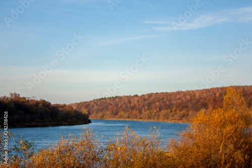 Autumn landscape with a view of the river Oka on a clear sunny day. Wildlife in the fall in central Russia. Colors of autumn.