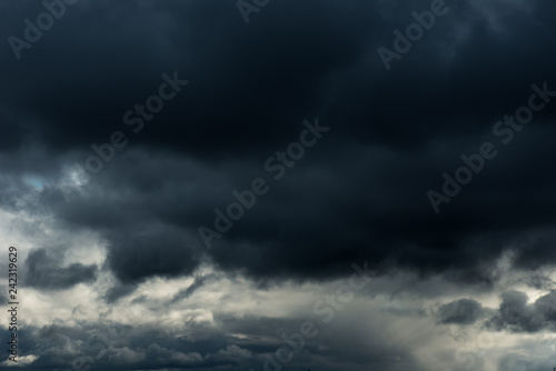 Fototapeta Naklejka Na Ścianę i Meble -  Beautiful grey Fluffy Rain Clouds. Cloudscape after bad weather. Autumn dark Storm Clouds over Black Sky.