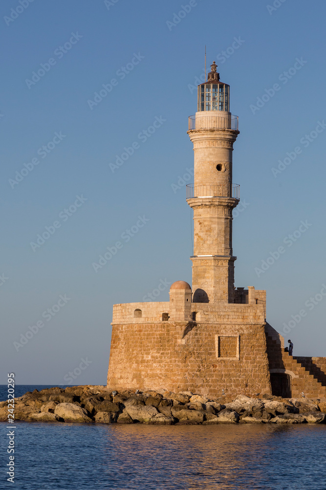 Chania Crete, 12-15-2018. Old light house at Chania harbor in  Crete  Greece