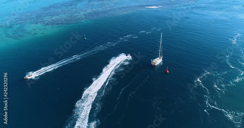 boat in a lagoon in aerial view, Papeete French Polynesia