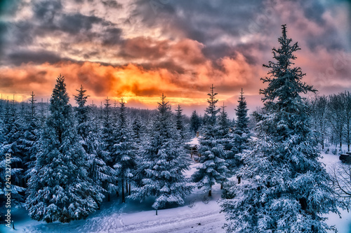 Majestic sunset in the winter mountains landscape.