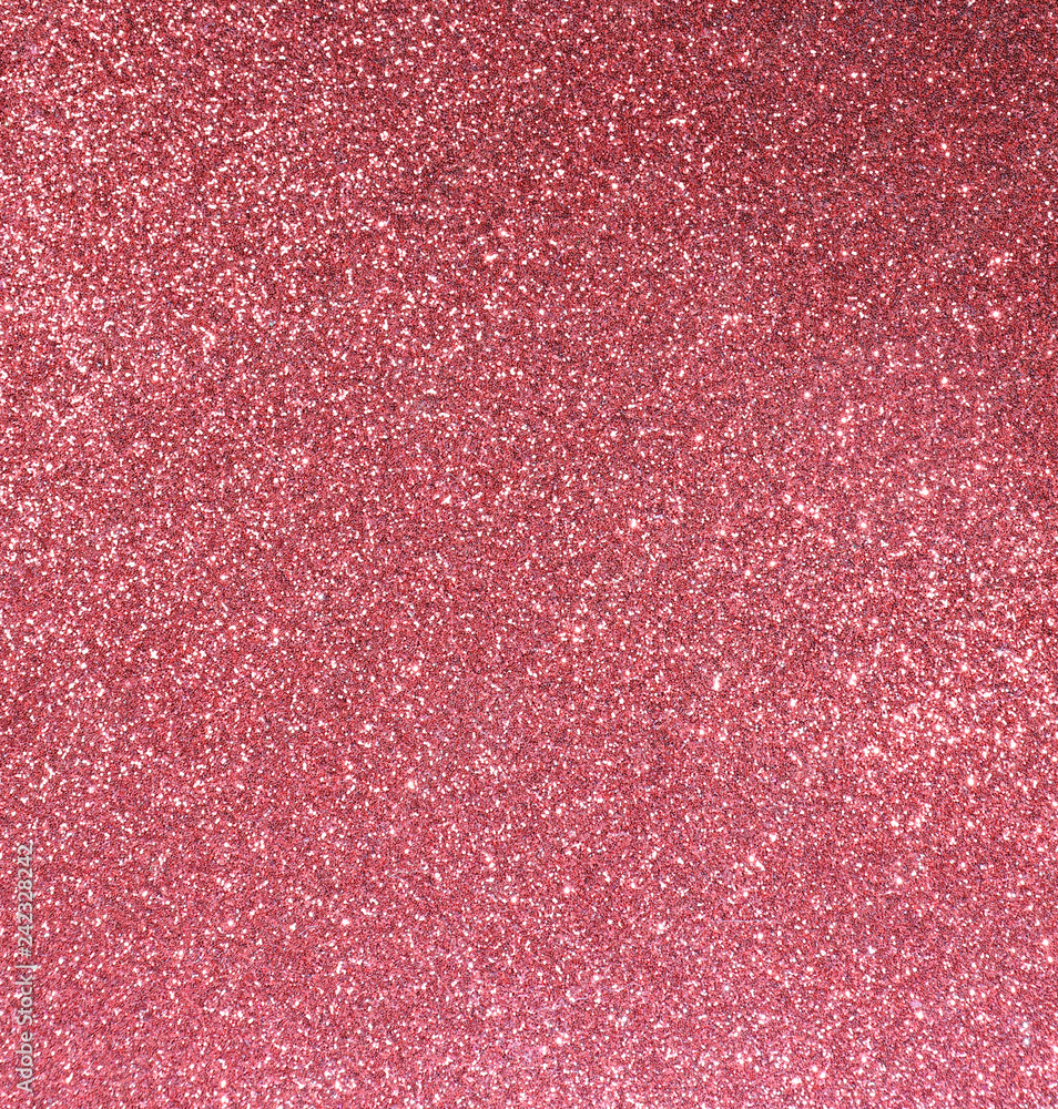 Fototapeta premium red background with plenty of glittering luminous glitter