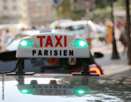 luminous taxi top sign in Paris
