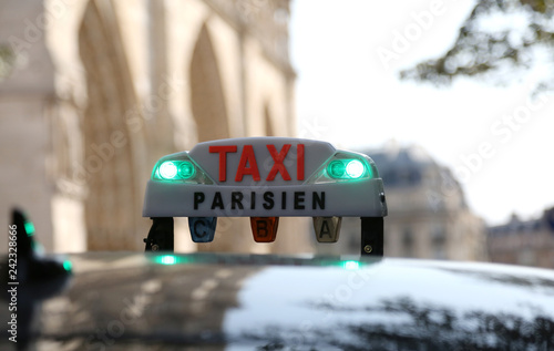French taxi text with access lights in the capital of France