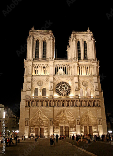 Notre Dame de Paris cathedral with some tourists