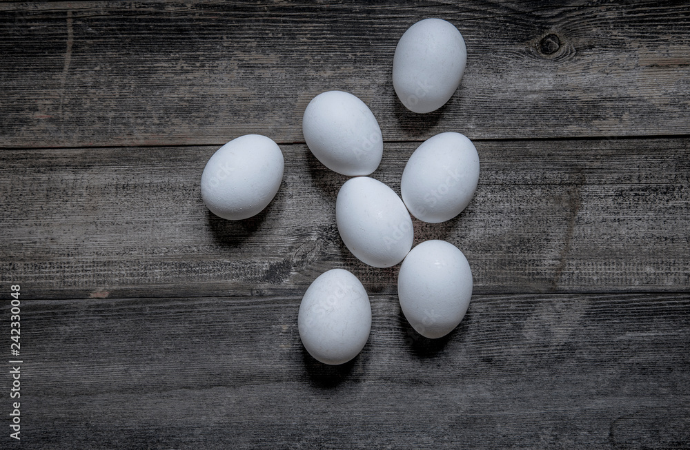Organic egg isolated on wooden background