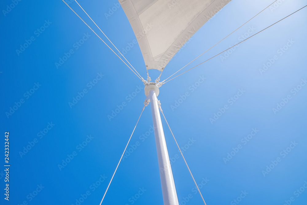 White tent in the blue sky
