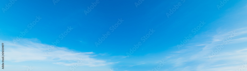 Fototapeta premium Small white clouds and blue sky