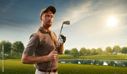 Fototapeta Naklejka Na Ścianę i Meble -  Male golf player on professional golf course. Golfer with golf club