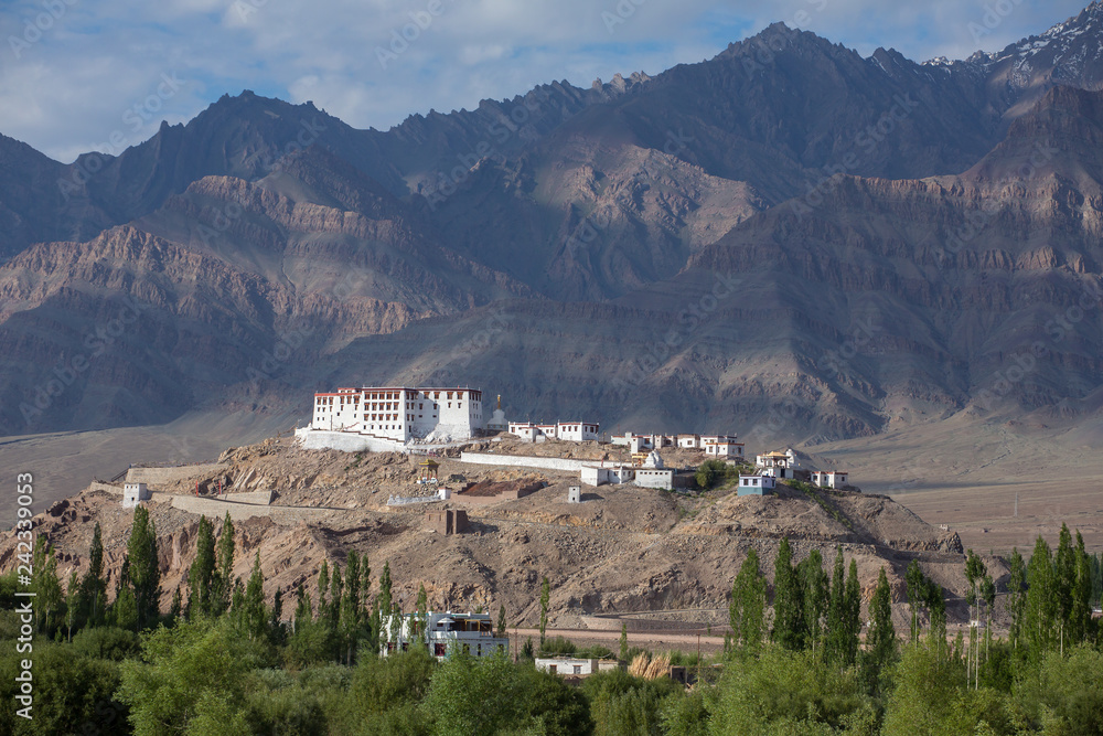 Stakna gompa temple ( buddhist monastery ) with a view of Himalaya mountains in Leh, Ladakh, Jammu and Kashmir, India.