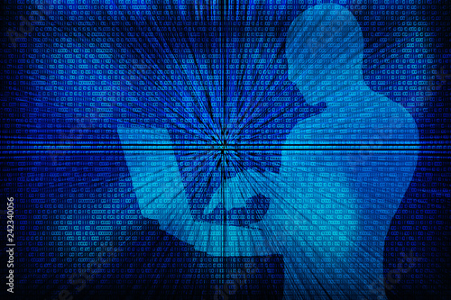 Silhouette of a hacker with laptop on a background with binary code