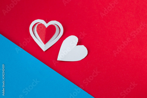Valentine's day background.symbol of love.white heart on red-blue background. eighth of March.space for text