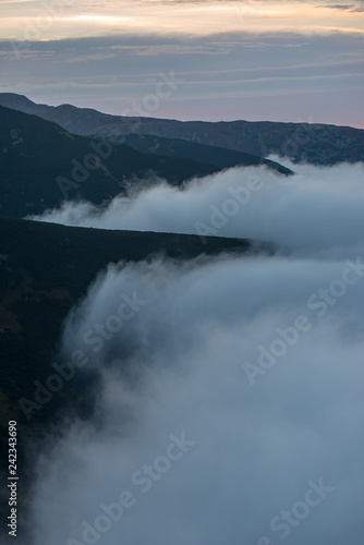 large misty cloud climbing mountain valley in slovakia, Tatra