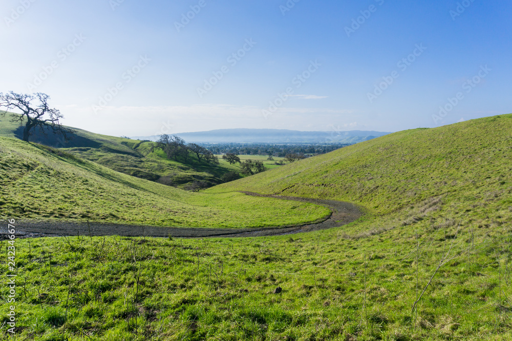 Path on the green hills and valleys of Coyote Lake - Harvey Bear Park, Morgan Hill, California