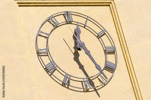 Classic watch on the tower of a building, California