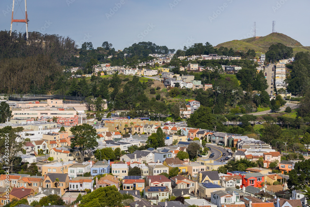 View towards Sutro tower and Twin peaks and the surrounding residential areas, San Francisco, California