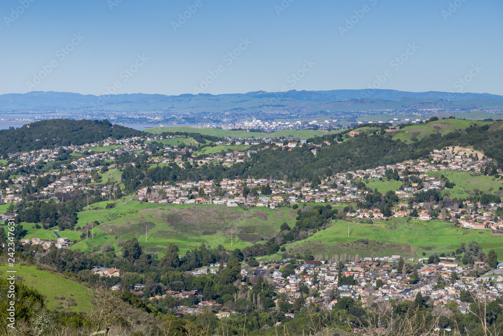 View towards residential neighborhoods in Richmond from Wildcat Canyon Regional Park, East San Francisco bay, Contra Costa county, California