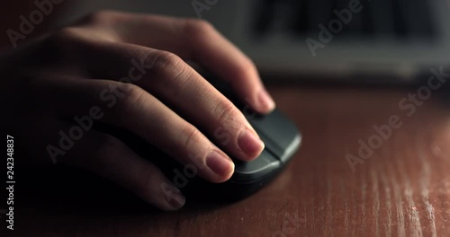 Close up view of woman hand use mouse at night. 4K Footage - Video