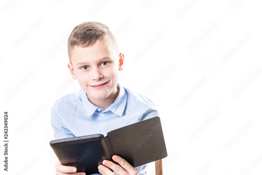young child reading strained in an e book reader on white background young child reading strained in an e book reader on white background