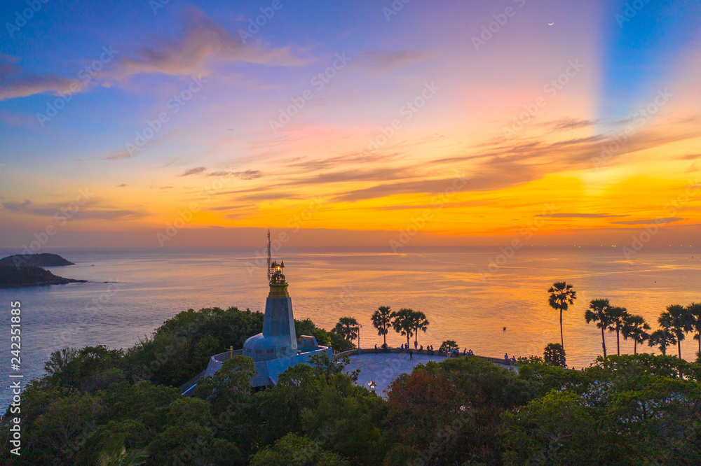 sunset above the great lighthouse at Promthep cape Phuket Thailand sunset above the great lighthouse at Promthep cape Phuket Thailand