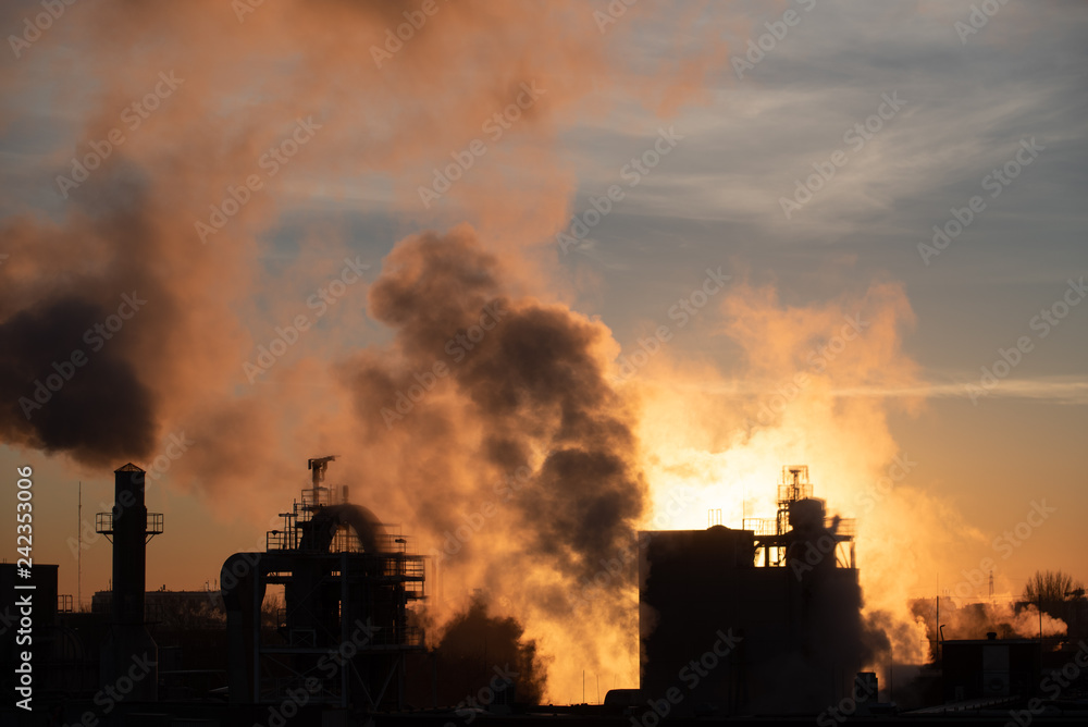 industrial steam at sunrise 