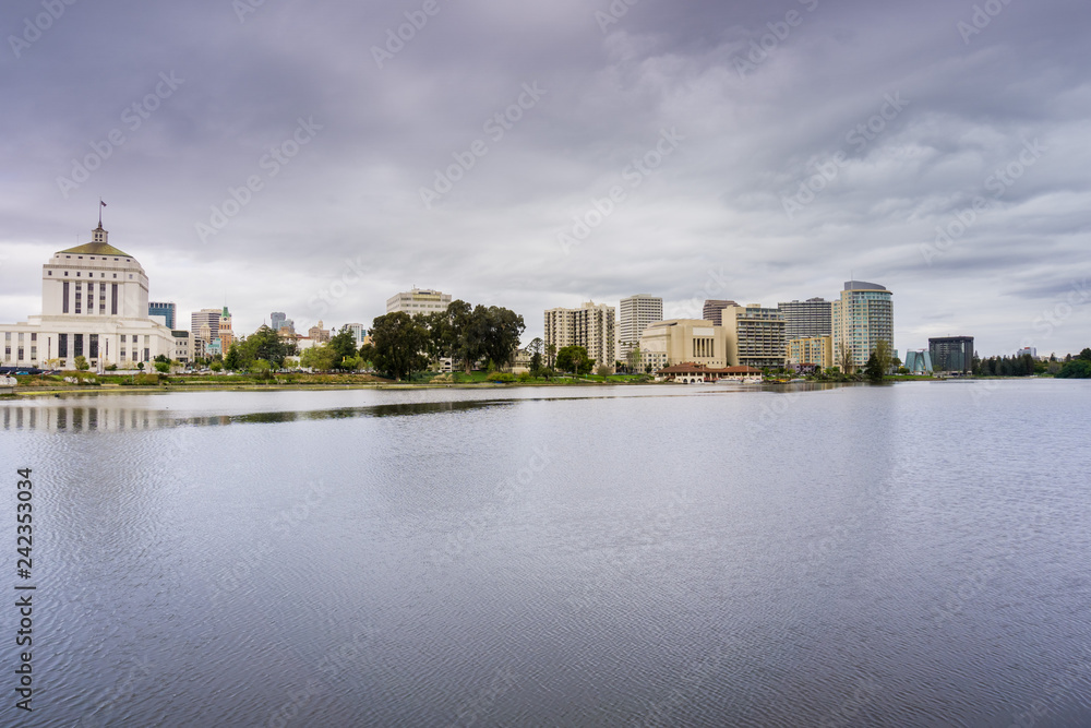 Downtown Oakland as seen from across Lake Merritt on a cloudy spring day, San Francisco bay area, California
