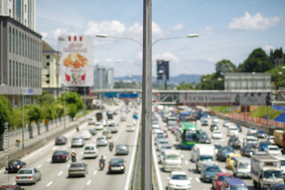 modern city traffic jam in the rush hour focus on pole