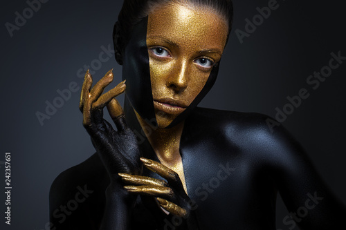 6,486 Black Gold Body Paint Royalty-Free Images, Stock Photos