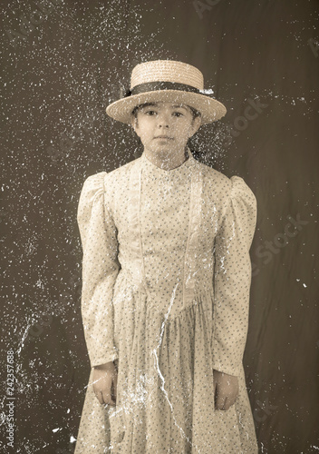 Fotografie Replica antique formal photo with dust and scratches of little girl in 1900’s cl