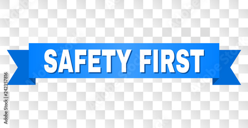 SAFETY FIRST text on a ribbon. Designed with white caption and blue tape. Vector banner with SAFETY FIRST tag on a transparent background.