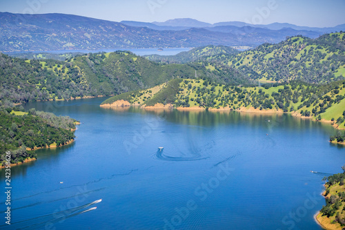 Boats after leaving Pleasure cove in south Berryessa lake from Stebbins Cold Canyon, Napa Valley, California
