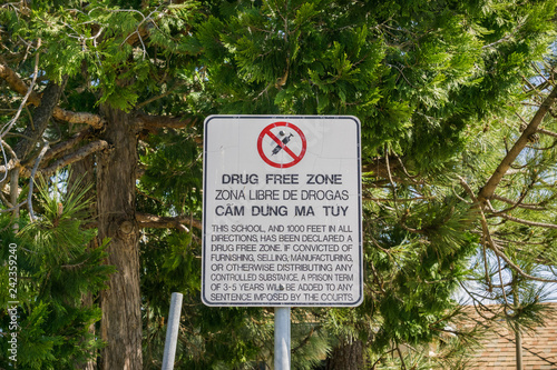 Drug Free Zone sign posted near a school, California