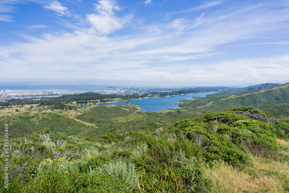 View towards San Andreas reservoir; the towns of San Francisco bay in the background, California