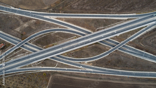 Aerial view of highway and overpass. Road junction, highway intersection top view