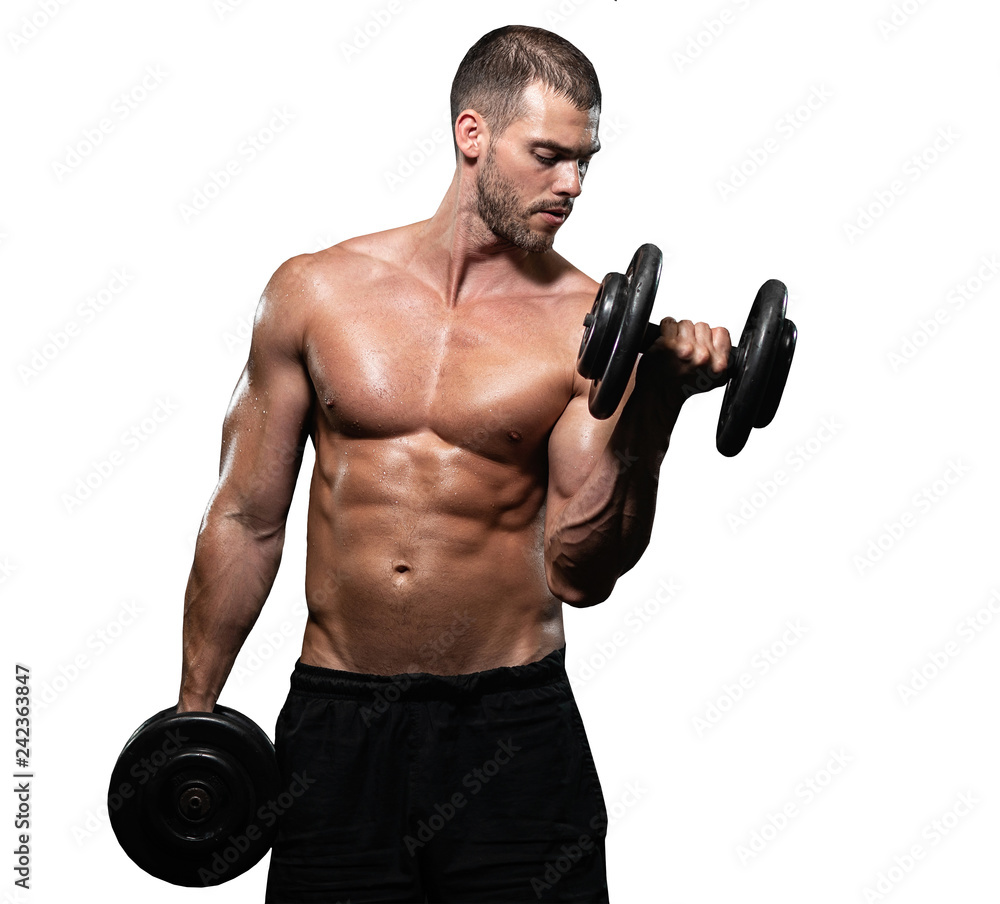 isolated man trains. Athletic man trains with dumbbells, pumping his biceps isolated man trains. Athletic man trains with dumbbells, pumping his biceps