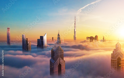Dubai sunset view of downtown covered with clouds