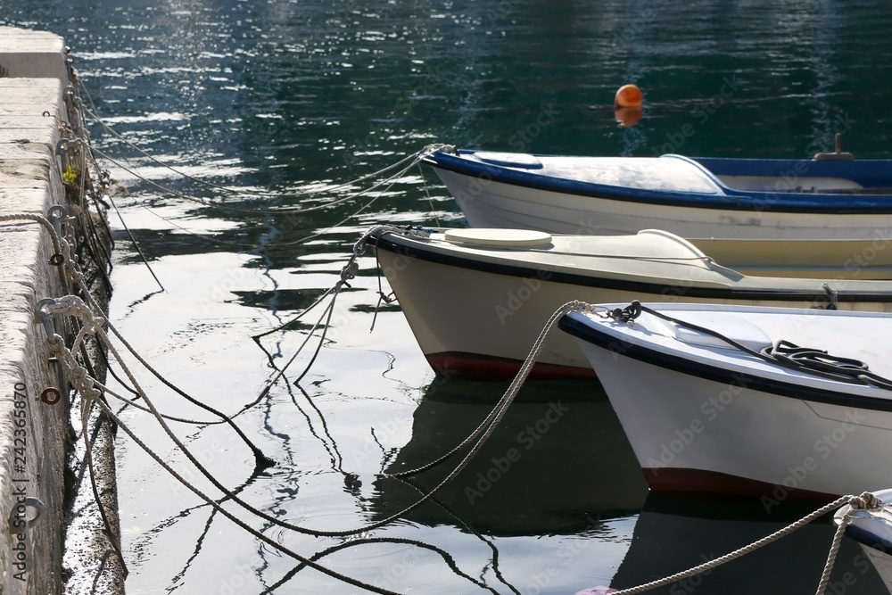 Small fishing boats on a dock. Selective focus.