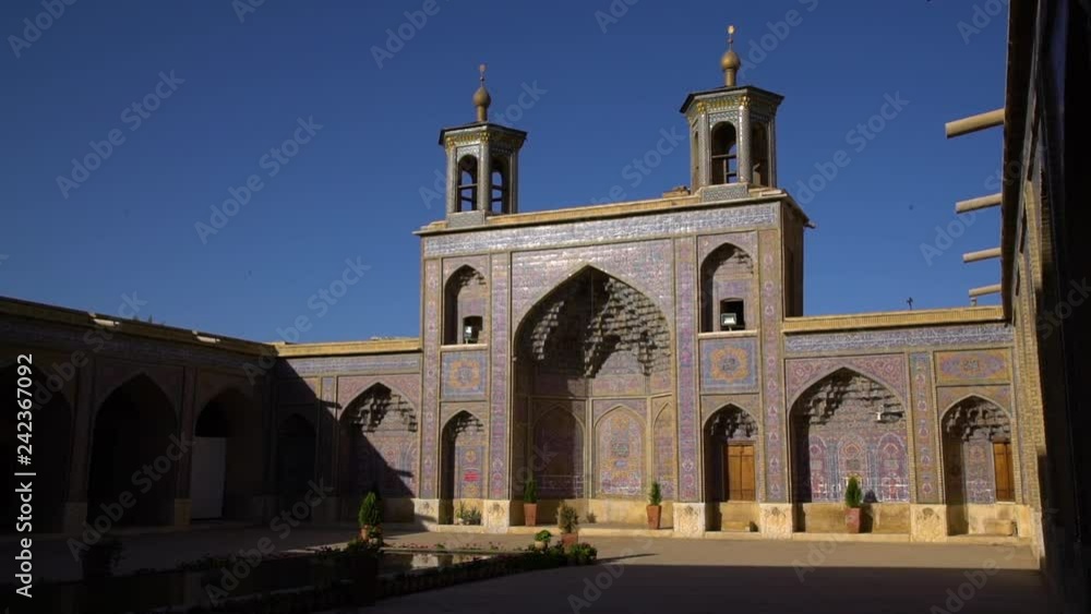 A low angle view of decorated patterns on the tiled wall of a mosque A low angle view of decorated patterns on the tiled wall of a mosque
