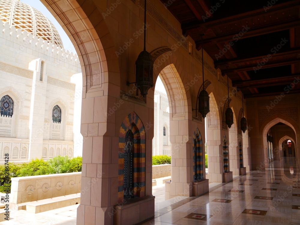outside scene of the Sultan Qaboos Grand Mosque, arab architechture masterpiece, Oman, Middle East