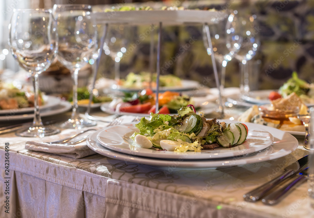 Serving dishes in the restaurant. luxury dinner served on the table Stock  Photo | Adobe Stock