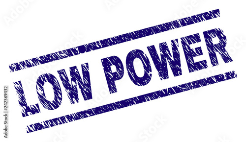 LOW POWER seal print with distress style. Blue vector rubber print of LOW POWER text with unclean texture. Text tag is placed between parallel lines.
