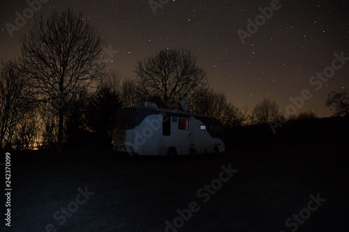 Camper van on a starry night