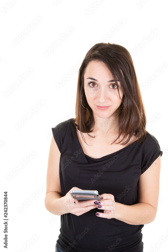 Portrait of a casual woman holding smartphone over white background Portrait of a casual woman holding smartphone over white background