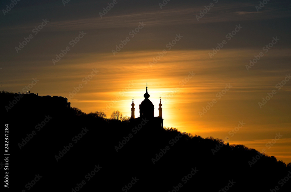 Silhouette of the church on a shout on a sunset background Silhouette of the church on a shout on a sunset background