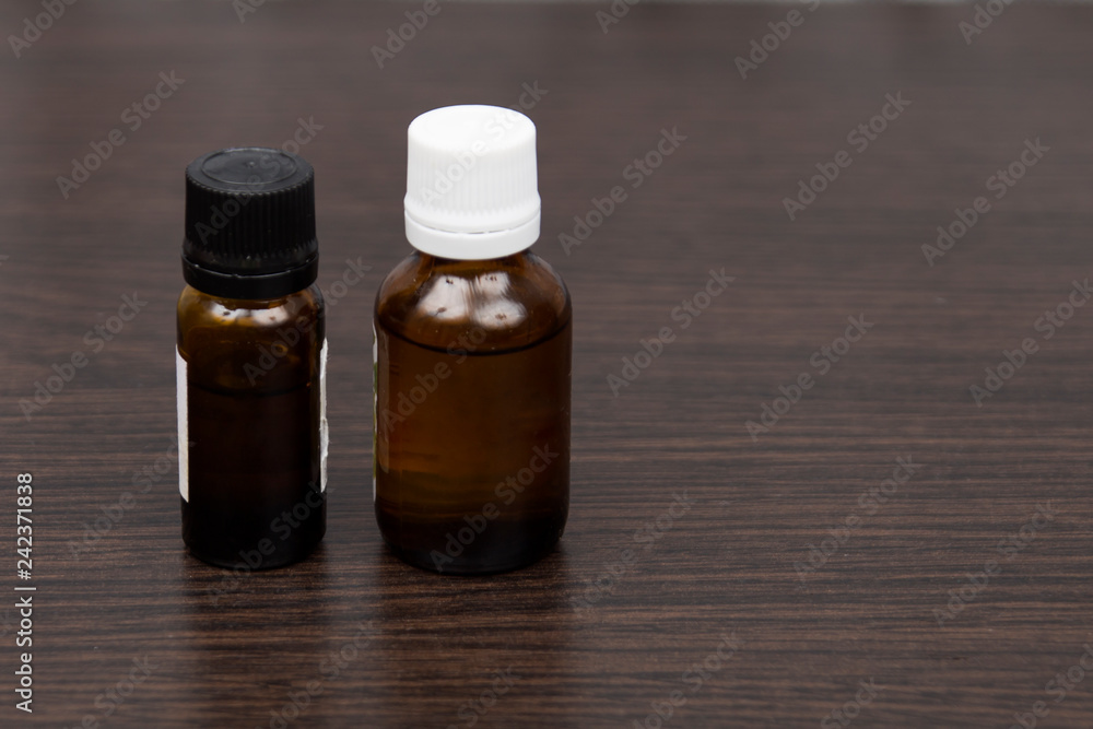 two brown bottle. fluid and laboratory two brown bottle. fluid and laboratory